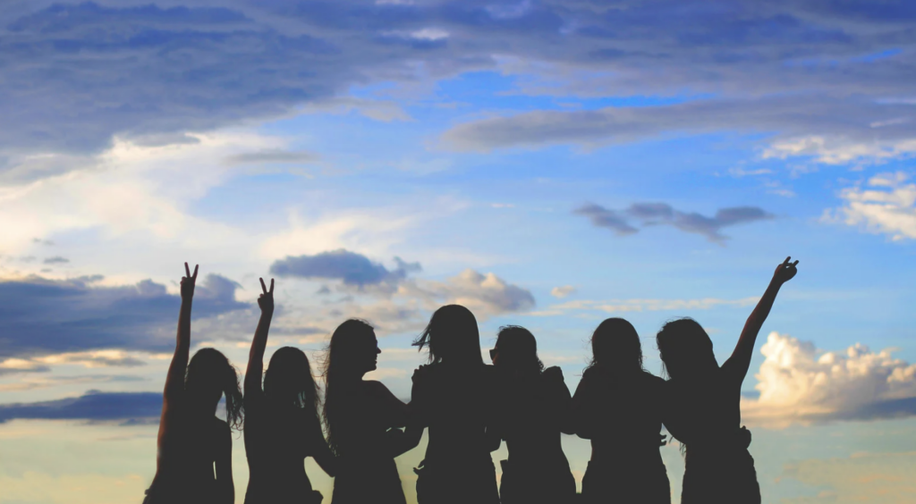 women meditating together
